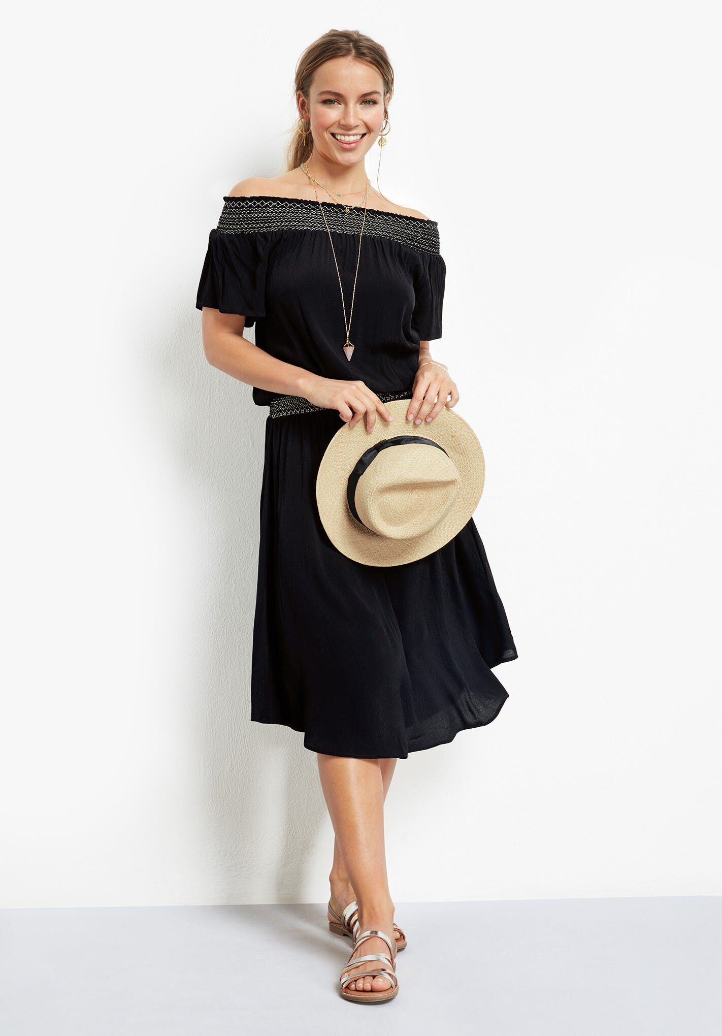 off the shoulder black and gold dress