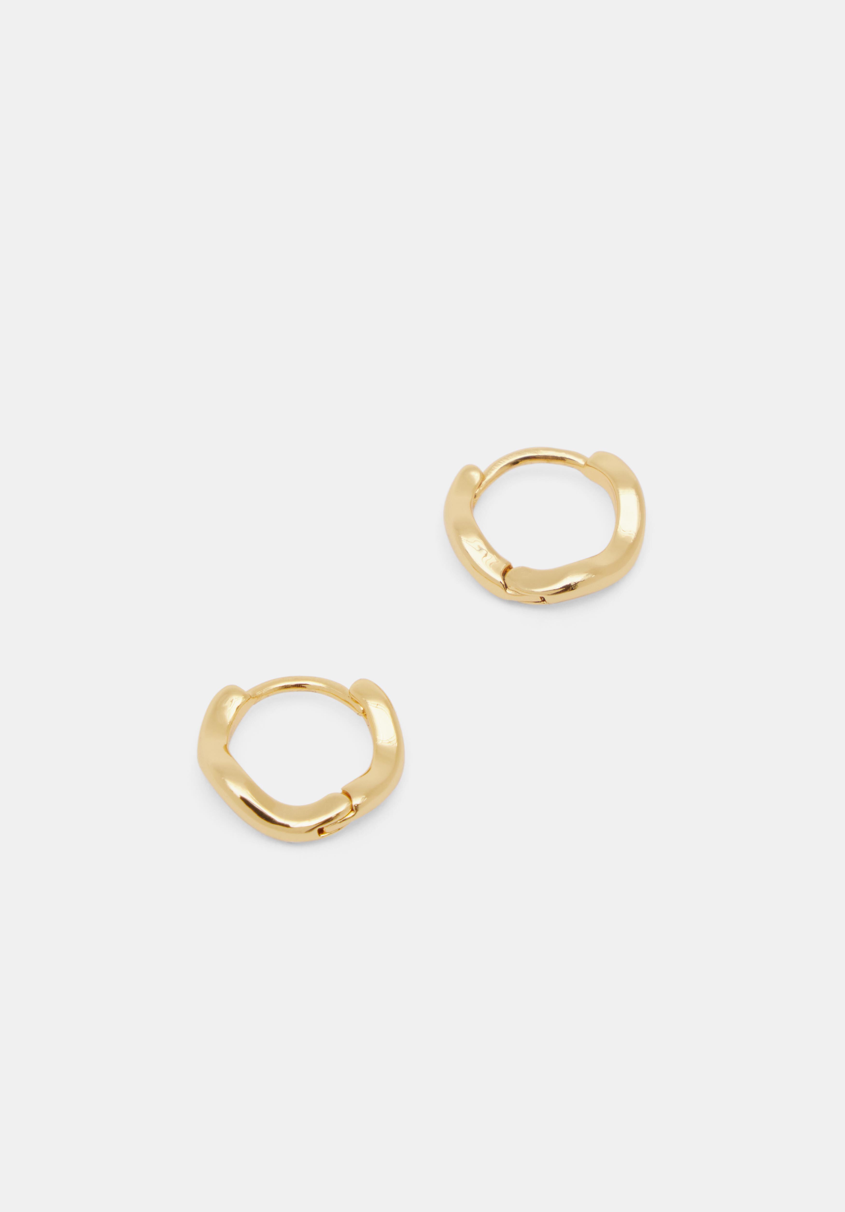 Twist huggie best sale earrings