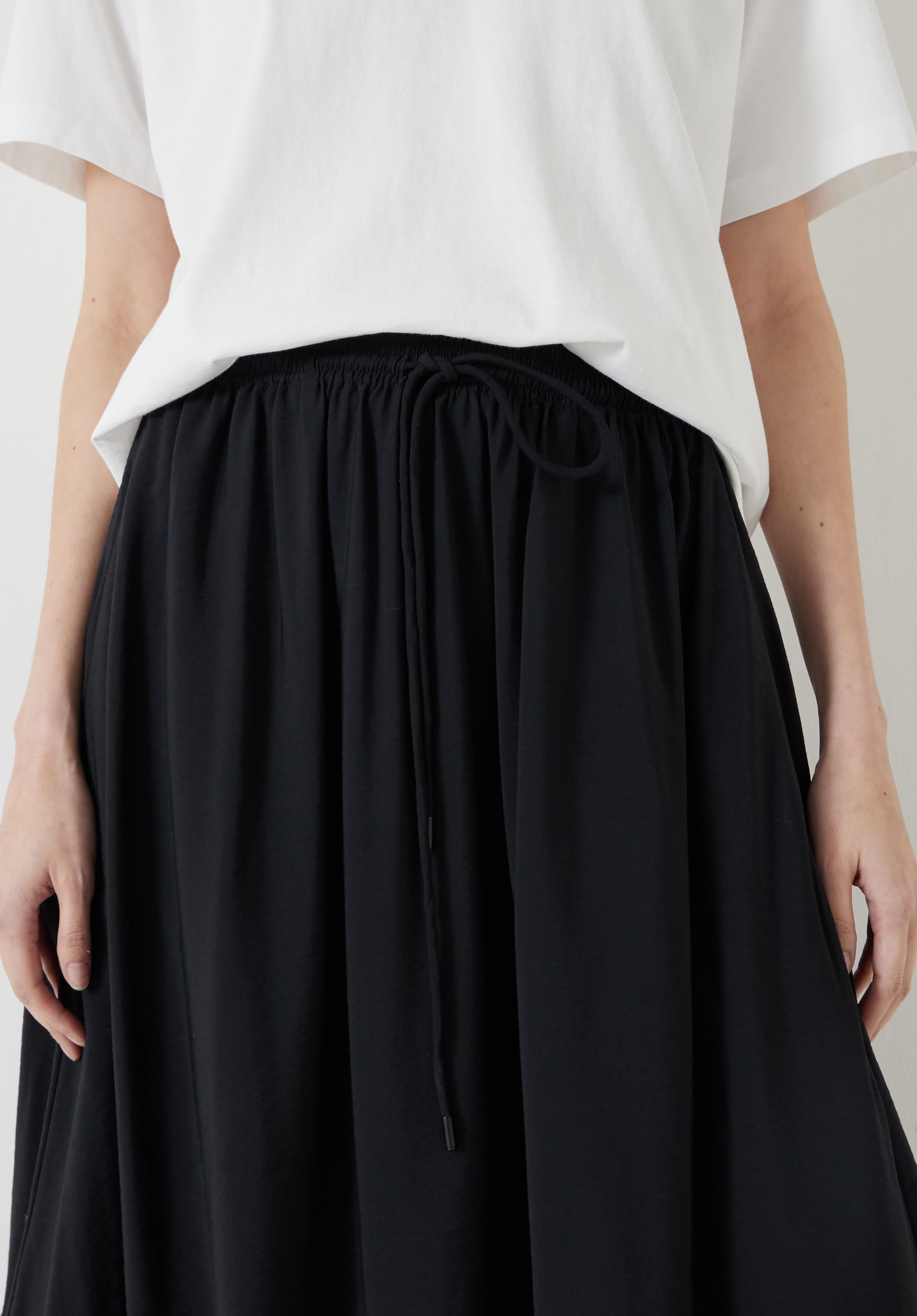 【HUGYOURSKIN】Balloon Padded Midi Skirt in Black Balloon Midi Skirt • ESTHE